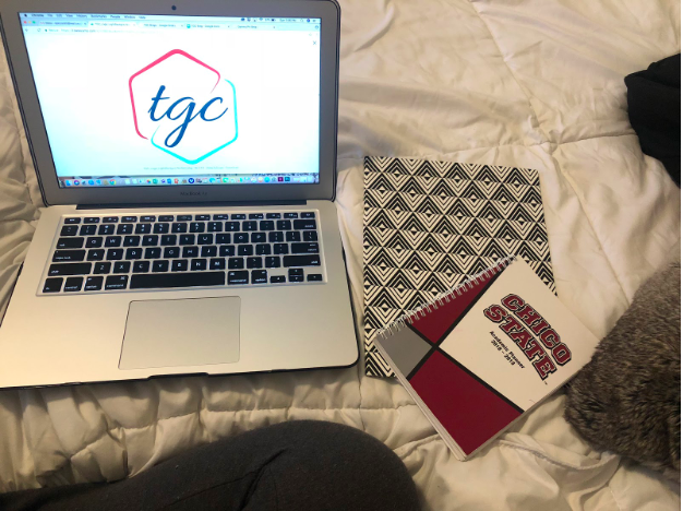 Picture of tgc laptop, planner and notebook.